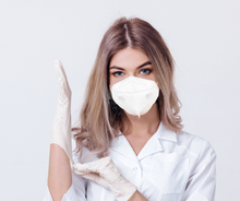 Load image into Gallery viewer, Woman wearing white M93i mask
