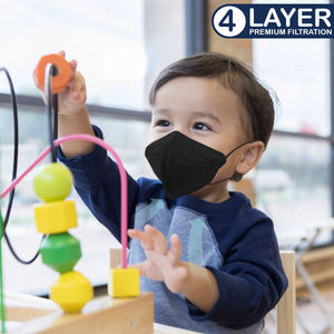 M94k face mask baby playing with toys in kindergarten
