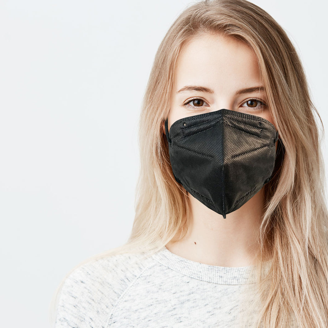 Woman wearing obsidian black M95i mask