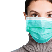 Load image into Gallery viewer, Woman wearing mint green mask
