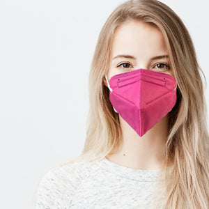 Woman wearing hot pink M95i mask