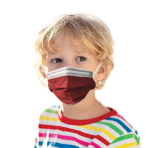 Boy wearing ruby red and obsidian black  mask