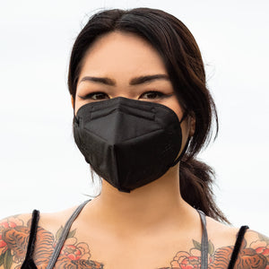 Woman wearing obsidian black M95i mask